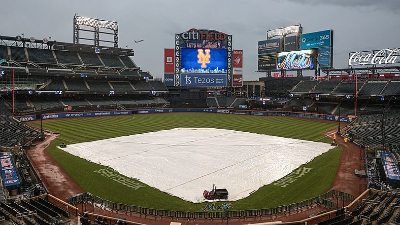 Oct 3, 2022; New York City, New York, USA; A general view of the tarp on the field before the game between the New York Mets and the Washington Nationals at Citi Field. Mandatory Credit: Vincent Carchietta-USA TODAY Sports