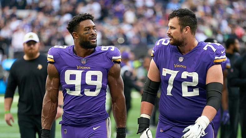 Oct 2, 2022;  London, United Kingdom;  Minnesota Vikings linebacker Danielle Hunter (99) and Minnesota Vikings guard Ezra Cleveland (72) during the NFL International Series game at Tottenham Hotspur Stadium. Mandatory Credit: Peter van den Berg-USA TODAY Sports