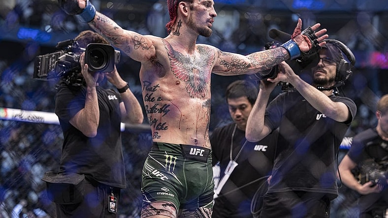 Oct 22, 2022; Abu Dhabi, UAE;  Sean O'Malley (blue gloves) defeats Petr Yan (red gloveS) during UFC 280 at Etihad Arena. Mandatory Credit: Craig Kidwell-USA TODAY Sports