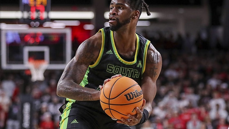 Feb 11, 2023; Cincinnati, Ohio, USA; South Florida Bulls guard Selton Miguel (1) holds the ball against the Cincinnati Bearcats in the second half at Fifth Third Arena. Mandatory Credit: Katie Stratman-USA TODAY Sports