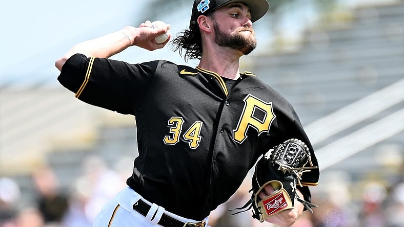Mar 5, 2023; Bradenton, Florida, USA; Pittsburgh Pirates pitcher JT Brubaker (34) throws a pitch in the first inning of a spring training game against the Minnesota Twins at LECOM Park. Mandatory Credit: Jonathan Dyer-USA TODAY Sports