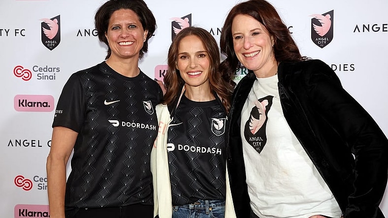 Mar 26, 2023; Los Angeles, California, USA; Angel City FC co-founder Julie Uhrman (left) and co-founder Natalie Portman (center) and co-founder Kara Nortman pose for a photo on the pink carpet before the game against New Jersey/New York Gotham FC at BMO Stadium. Mandatory Credit: Kiyoshi Mio-USA TODAY Sports