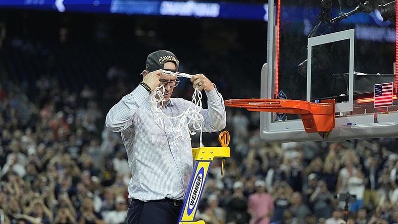 Apr 3, 2023; Houston, TX, USA; Connecticut Huskies head coach Dan Hurley celebrates after cutting down the net after defeating the San Diego State Aztecs in the national championship game of the 2023 NCAA Tournament at NRG Stadium. Mandatory Credit: Bob Donnan-USA TODAY Sports
