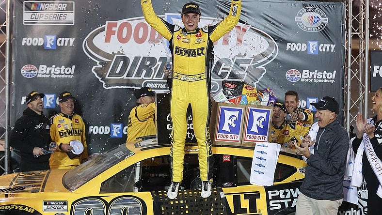 Apr 9, 2023; Bristol, Tennessee, USA; NASCAR Cup Series driver Christopher Bell (20) wins the Food City Dirt Race at the Bristol Motor Speedway Dirt Course. Mandatory Credit: Randy Sartin-USA TODAY Sports