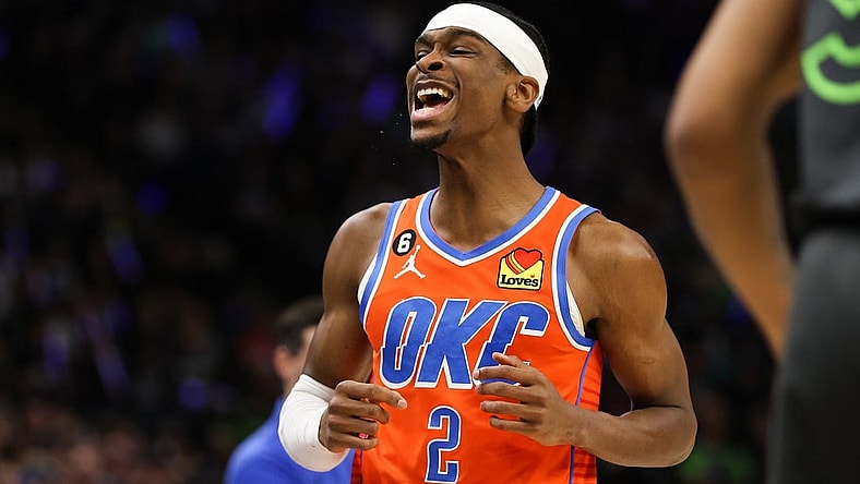 Apr 14, 2023; Minneapolis, Minnesota, USA; Oklahoma City Thunder guard Shai Gilgeous-Alexander (2) reacts to his shot against the Minnesota Timberwolves during the first quarter at Target Center. Mandatory Credit: Matt Krohn-USA TODAY Sports