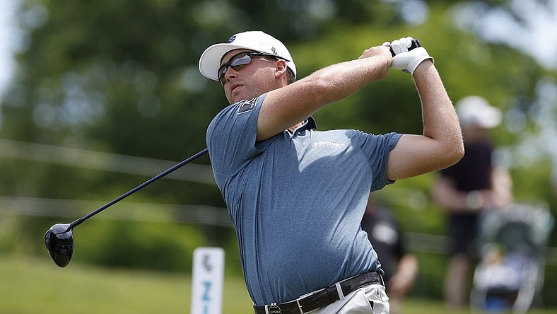 May 27, 2023; Potomac Falls, Virginia, USA; Andy Ogletree hits his tee shot on the second hole during the second round of LIV Golf Washington, D.C. golf tournament at Trump National. Mandatory Credit: Geoff Burke-USA TODAY Sports
