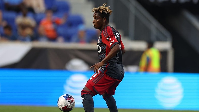 Jul 26, 2023; Harrison, NJ, USA; Toronto FC midfielder Latif Blessing (11) controls the ball against New York City FC during the first half at Red Bull Arena. Mandatory Credit: Vincent Carchietta-USA TODAY Sports