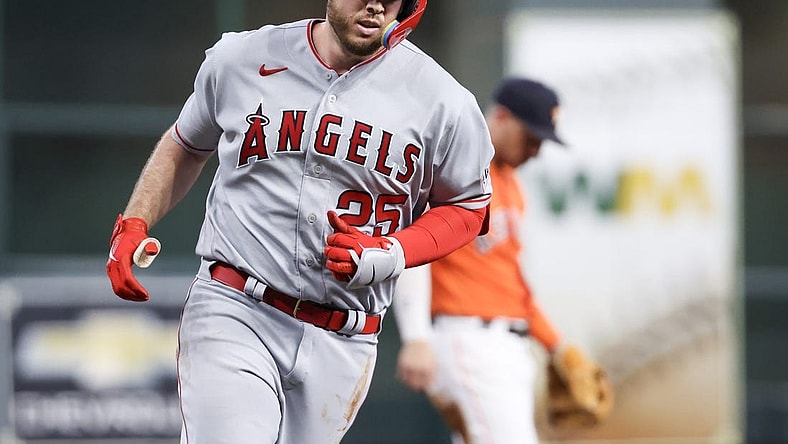 Aug 11, 2023; Houston, Texas, USA; Los Angeles Angels first baseman C.J. Cron (25) rounds the bases after hitting a home run against Houston Astros starting pitcher Justin Verlander (35) (not pictured) in the second inning at Minute Maid Park. Mandatory Credit: Thomas Shea-USA TODAY Sports