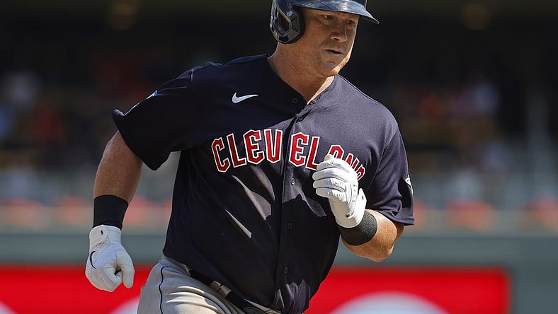 Aug 30, 2023; Minneapolis, Minnesota, USA; Cleveland Guardians first baseman Kole Calhoun (56) runs the bases on his three-run home run against the Minnesota Twins in the tenth inning at Target Field. Mandatory Credit: Bruce Kluckhohn-USA TODAY Sports