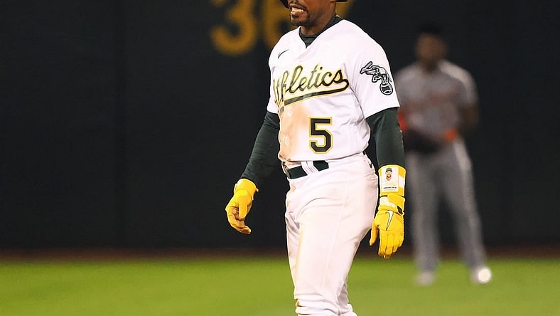 Sep 22, 2023; Oakland, California, USA; Oakland Athletics left fielder Tony Kemp (5) walks off an injury during the sixth inning against the Detroit Tigers at Oakland-Alameda County Coliseum. Mandatory Credit: Kelley L Cox-USA TODAY Sports