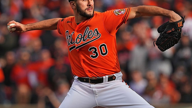 Oct 8, 2023; Baltimore, Maryland, USA; Baltimore Orioles starting pitcher Grayson Rodriguez (30) pitches during the first inning against the Texas Rangers during game two of the ALDS for the 2023 MLB playoffs at Oriole Park at Camden Yards. Mandatory Credit: Mitch Stringer-USA TODAY Sports