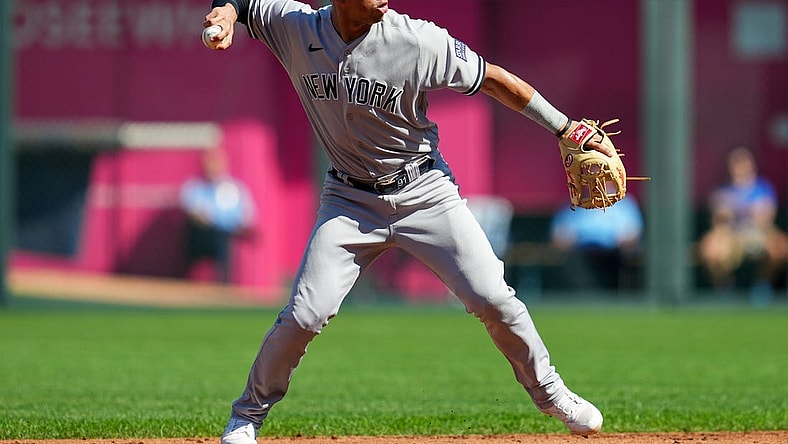Oct 1, 2023; Kansas City, Missouri, USA; New York Yankees second baseman Oswald Peraza (91) throws to first base during the first inning against the Kansas City Royals at Kauffman Stadium. Mandatory Credit: Jay Biggerstaff-USA TODAY Sports