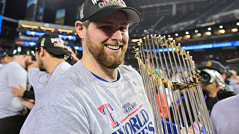 Nov 1, 2023; Phoenix, AZ, USA; Texas Rangers starting pitcher Jordan Montgomery (52) celebrates defeating the Arizona Diamondbacks to win the World Series  in game five of the 2023 World Series at Chase Field. Mandatory Credit: Matt Kartozian-USA TODAY Sports