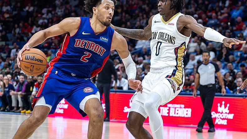 Nov 2, 2023; New Orleans, Louisiana, USA; Detroit Pistons guard Cade Cunningham (2) drives to the basket against New Orleans Pelicans guard Dereon Seabron (0) during the second half at the Smoothie King Center. Mandatory Credit: Stephen Lew-USA TODAY Sports
