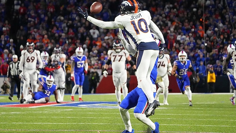 Nov 13, 2023; Orchard Park, New York, USA; Buffalo Bills cornerback Taron Johnson (7) pushes Denver Broncos wide receiver Jerry Jeudy (10) attempting to make a catch and is called for pass interference during the second half at Highmark Stadium. Mandatory Credit: Gregory Fisher-USA TODAY Sports