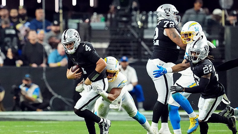 Dec 14, 2023; Paradise, Nevada, USA; Los Angeles Chargers linebacker Eric Kendricks (6) sacks Las Vegas Raiders quarterback Aidan O'Connell (4) in the third quarter at Allegiant Stadium. Mandatory Credit: Stephen R. Sylvanie-USA TODAY Sports