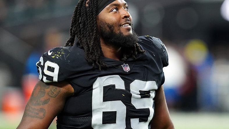 Dec 14, 2023; Paradise, Nevada, USA;  Las Vegas Raiders defensive tackle Adam Butler (69) smiles after the game against the Los Angeles Chargers at Allegiant Stadium. Mandatory Credit: Stephen R. Sylvanie-USA TODAY Sports