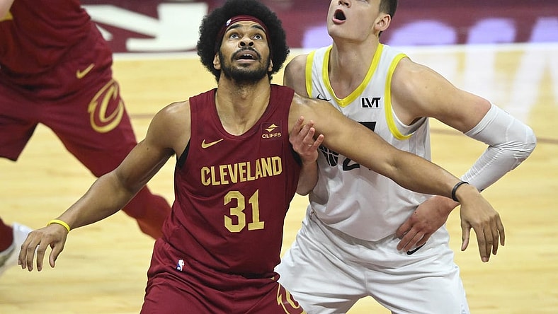 Dec 20, 2023; Cleveland, Ohio, USA; Cleveland Cavaliers center Jarrett Allen (31) and Utah Jazz center Walker Kessler (24) look to rebound in the first quarter at Rocket Mortgage FieldHouse. Mandatory Credit: David Richard-USA TODAY Sports