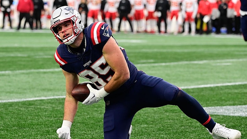 Dec 17, 2023; Foxborough, Massachusetts, USA; New England Patriots tight end Hunter Henry (85) scores a touchdown against the Kansas City Chiefs during the first half at Gillette Stadium. Mandatory Credit: Eric Canha-USA TODAY Sports