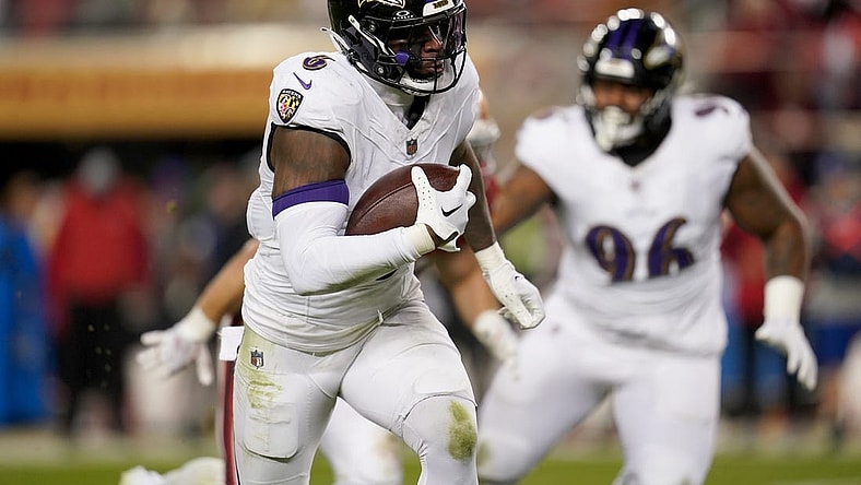 Dec 25, 2023; Santa Clara, California, USA; Baltimore Ravens linebacker Patrick Queen (6) runs with the ball after intercepting a pass against the San Francisco 49ers in the third quarter at Levi's Stadium. Mandatory Credit: Cary Edmondson-USA TODAY Sports