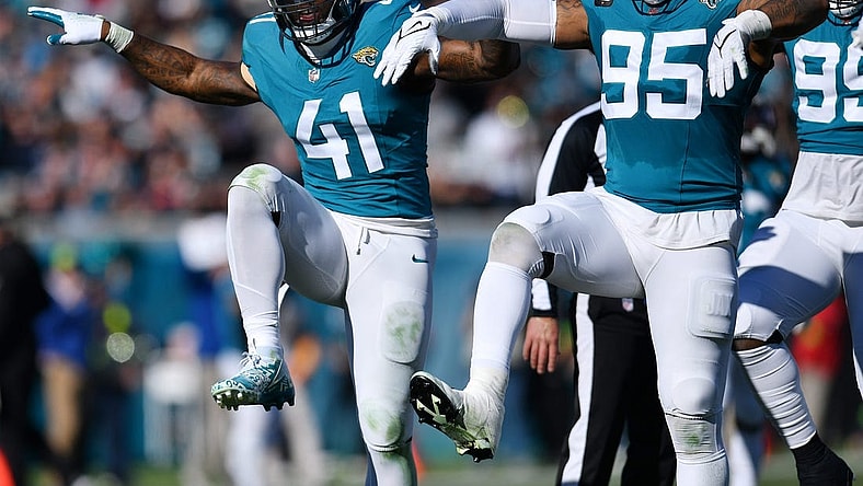 Jacksonville Jaguars linebacker Josh Allen (41) celebrates with teammates after setting the Jaguars single season record for sacks during second quarter action. The Jacksonville Jaguars hosted the Carolina Panthers at EverBank Stadium in Jacksonville, FL Sunday, December 31, 2023. The Jaguars went in at the half with a 9 to 0 lead.
