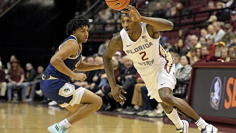 Jan 3, 2024; Tallahassee, Florida, USA; Florida State Seminoles forward Jamir Watkins (2) dribbles towards the net during the first half against the Georgia Tech Yellow Jackets at Donald L. Tucker Center. Mandatory Credit: Melina Myers-USA TODAY Sports