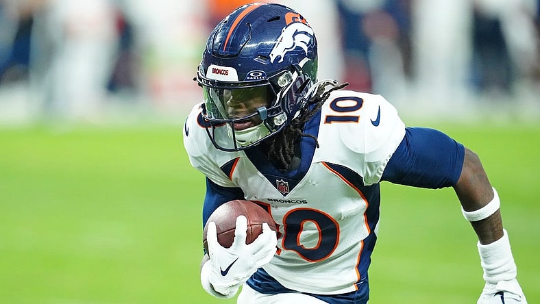 Jan 7, 2024; Paradise, Nevada, USA; Denver Broncos wide receiver Jerry Jeudy (10) gains yardage against the Las Vegas Raiders during the fourth quarter at Allegiant Stadium. Mandatory Credit: Stephen R. Sylvanie-USA TODAY Sports