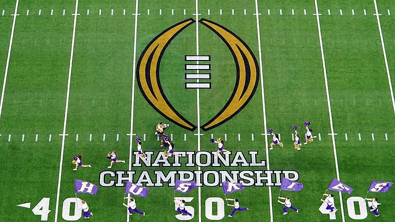 Jan 8, 2024; Houston, TX, USA; A general view as the Washington Huskies take the field before to the 2024 College Football Playoff national championship game at NRG Stadium. Mandatory Credit: James Lang-USA TODAY Sports