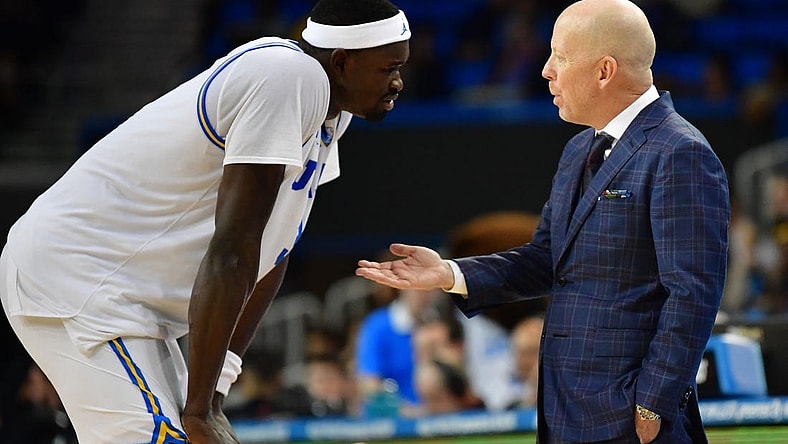 January 14, 2024; Los Angeles, California, USA; UCLA Bruins head coach Mick Cronin speaks to forward Adem Bona (3) during the second half at Pauley Pavilion. Mandatory Credit: Gary A. Vasquez-USA TODAY Sports