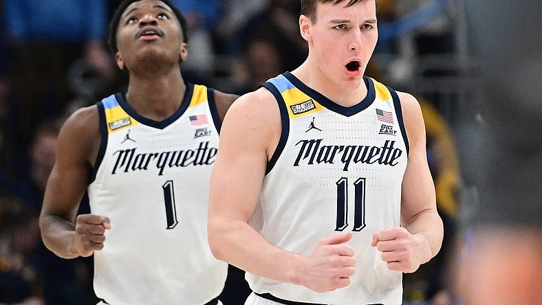 Jan 15, 2024; Milwaukee, Wisconsin, USA; Marquette Golden Eagles guard Tyler Kolek (11) reacts after scoring a basket in the second half against the Villanova Wildcats at Fiserv Forum. Mandatory Credit: Benny Sieu-USA TODAY Sports