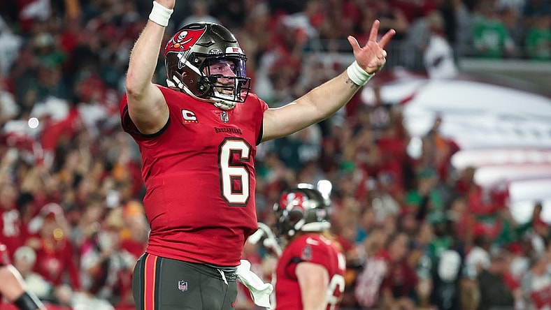 Jan 15, 2024; Tampa, Florida, USA; Tampa Bay Buccaneers quarterback Baker Mayfield (6) celebrates a touchdown against the Philadelphia Eagles during the first half of a 2024 NFC wild card game at Raymond James Stadium. Mandatory Credit: Kim Klement Neitzel-USA TODAY Sports
