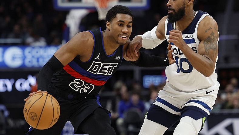Jan 17, 2024; Detroit, Michigan, USA; Detroit Pistons guard Jaden Ivey (23) dribbles defended by Minnesota Timberwolves guard Mike Conley (10) in the second half at Little Caesars Arena. Mandatory Credit: Rick Osentoski-USA TODAY Sports