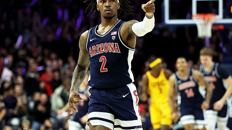Arizona Wildcats guard Caleb Love (2) celebrates a 3-point basket against the USC Trojans at McKale Center. Mandatory Credit: Zachary BonDurant-USA TODAY Sports
