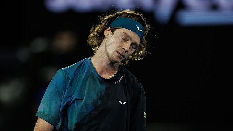 Jan 23, 2024; Melbourne, Victoria, Australia;  Andrey Rublev of Russia reacts during his match against Jannik Sinner of Italy in the quarter final of the men s singles. Mandatory Credit: Mike Frey-USA TODAY Sports