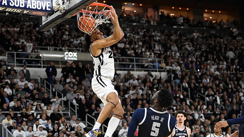 Jan 27, 2024; Providence, Rhode Island, USA; Providence Friars guard Devin Carter (22)  makes a reverse dunk during the first half against the Georgetown Hoyas at Amica Mutual Pavilion. Mandatory Credit: Eric Canha-USA TODAY Sports