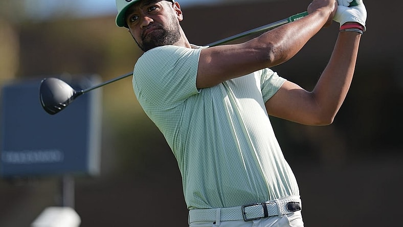Jan 27, 2024; San Diego, California, USA; Tony Finau hits his tee shot on the fourteenth hole during the final round of the Farmers Insurance Open golf tournament at Torrey Pines Municipal Golf Course - South Course. Mandatory Credit: Ray Acevedo-USA TODAY Sports
