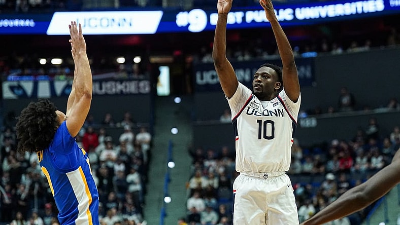 Jan 28, 2024; Hartford, Connecticut, USA; UConn Huskies guard Hassan Diarra (10) shoots for three points against the Xavier Musketeers in the second half at XL Center. Mandatory Credit: David Butler II-USA TODAY Sports
