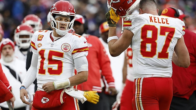 Jan 28, 2024; Baltimore, Maryland, USA; Kansas City Chiefs quarterback Patrick Mahomes (15) celebrates with Chiefs tight end Travis Kelce (87) after a touchdown against the Baltimore Ravens in the AFC Championship football game at M&T Bank Stadium. Mandatory Credit: Geoff Burke-USA TODAY Sports