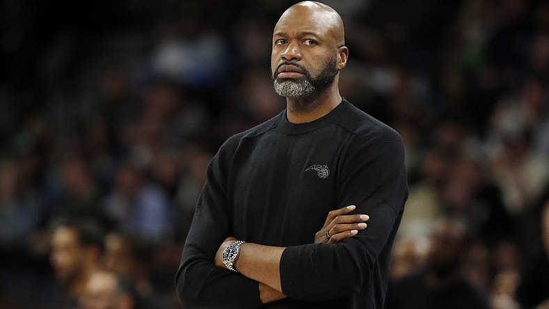 Feb 2, 2024; Minneapolis, Minnesota, USA; Orlando Magic head coach Jamahl Mosley watches as his team plays the Minnesota Timberwolves in the third quarter at Target Center. Mandatory Credit: Bruce Kluckhohn-USA TODAY Sports