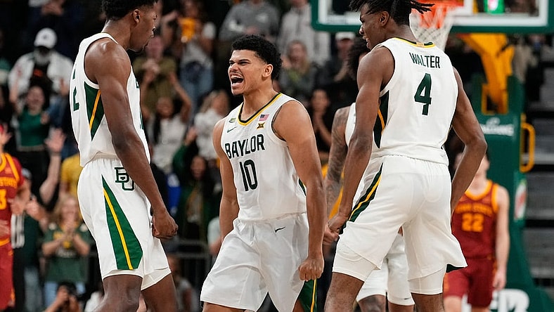 Feb 3, 2024; Waco, Texas, USA; Baylor Bears guard RayJ Dennis (10) celebrates with teammates after scoring a three point basket against the Iowa State Cyclones during the second half at Paul and Alejandra Foster Pavilion. Mandatory Credit: Chris Jones-USA TODAY Sports