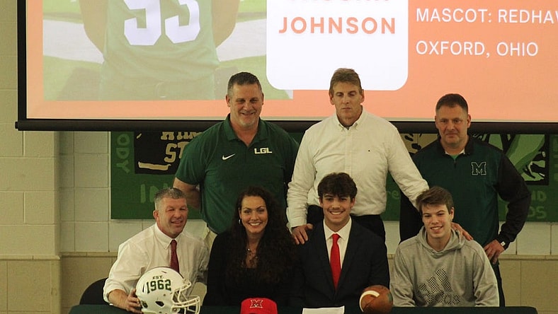Mason senior Vaughn Johnson signs to play football for Miami (Ohio). Mason High School celebrated 35 seniors signing national letters of intent Feb. 7. 2024.