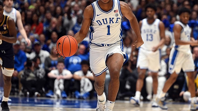 Feb 7, 2024; Durham, North Carolina, USA;  Duke Blue Devils guard Caleb Foster (1) dribbles up court during the second half against the Notre Dame Fighting Irish at Cameron Indoor Stadium. The  Blue Devils won 71-53.Mandatory Credit: Rob Kinnan-USA TODAY Sports