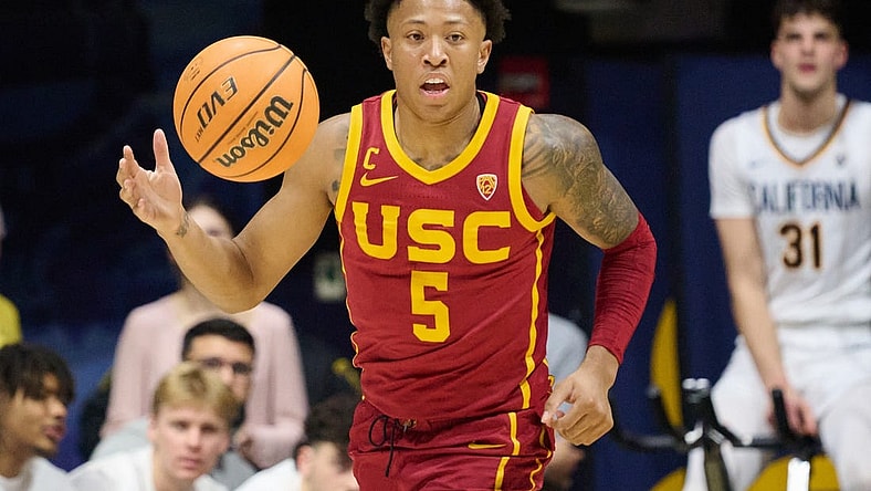 Feb 7, 2024; Berkeley, California, USA; USC Trojans guard Boogie Ellis (5) dribbles the ball against the California Golden Bears during the second half at Haas Pavilion. Mandatory Credit: Robert Edwards-USA TODAY Sports