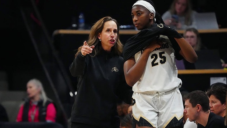 Feb 9, 2024; Boulder, Colorado, USA; Colorado Buffaloes head coach JR Payne talks to forward Brianna McLeod (25) in the second half against the Oregon Ducks at CU Events Center. Mandatory Credit: Ron Chenoy-USA TODAY Sports
