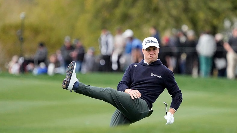 Justin Thomas reacts after his pitch onto the 15th green during round 2 of the WM Phoenix Open at TPC Scottsdale on Feb. 8, 2024.