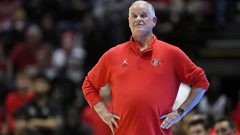 Feb 13, 2024; San Diego, California, USA; San Diego State Aztecs head coach Brian Dutcher looks on during the first half against the Colorado State Rams at Viejas Arena. Mandatory Credit: Orlando Ramirez-USA TODAY Sports