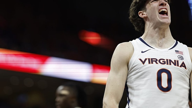 Feb 17, 2024; Charlottesville, Virginia, USA; Virginia Cavaliers forward Blake Buchanan (0) reacts after scoring while being fouled against the Wake Forest Demon Deacons in the second half at John Paul Jones Arena. Mandatory Credit: Geoff Burke-USA TODAY Sports