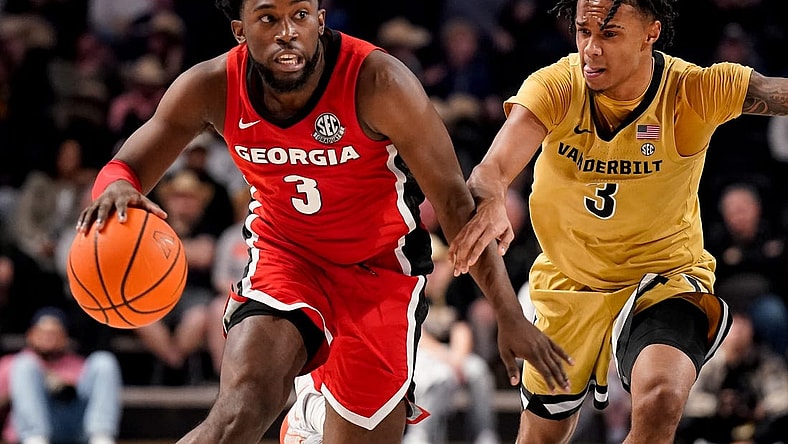 Georgia guard Noah Thomasson (3) is guarded by Vanderbilt guard Paul Lewis (3) during the second half at Memorial Gym in Nashville, Tenn., Wednesday, Feb. 21, 2024.