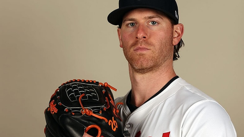 Feb 22, 2024; Lee County, FL, USA;  Minnesota Twins starting pitcher Anthony DeSclafani (21) poses for a photo during photo day at Hammond Stadium. Mandatory Credit: Kim Klement Neitzel-USA TODAY Sports