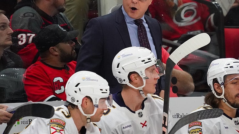Feb 22, 2024; Raleigh, North Carolina, USA; Florida Panthers head coach Paul Maurice reacts from behind the bench during the second period against the Carolina Hurricanes at PNC Arena. Mandatory Credit: James Guillory-USA TODAY Sports